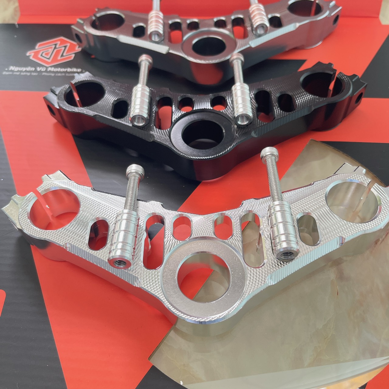 Chảng ba CNC Satria Raider Fi