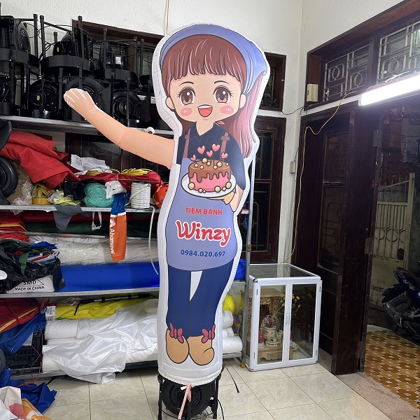 Rối Hơi vẫy tay quảng cáo nhà hàng Bánh Mì, Bánh Kem