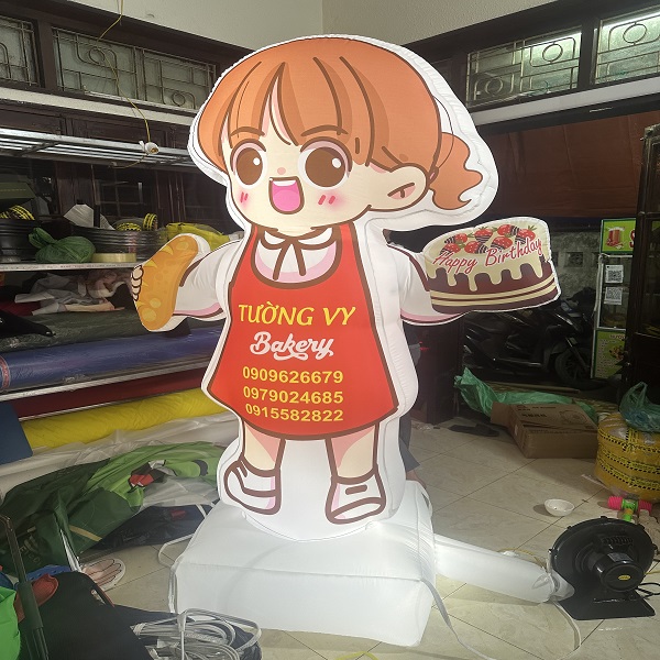 Rối Hơi vẫy tay quảng cáo nhà hàng Bánh Mì, Bánh Kem