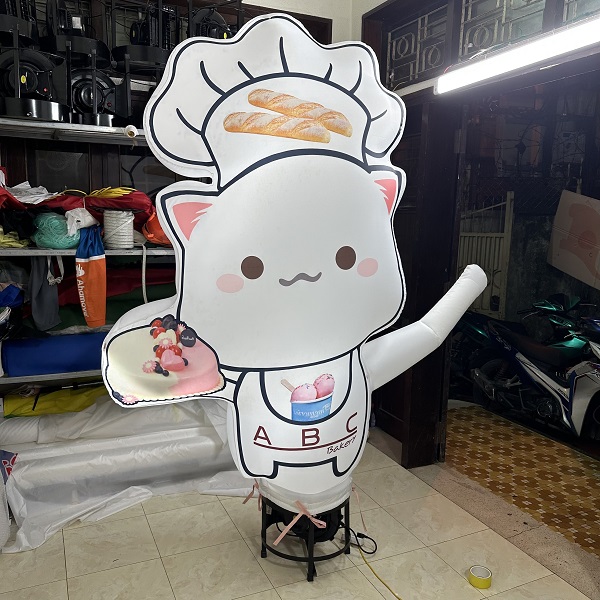 Rối Hơi vẫy tay quảng cáo nhà hàng Bánh Mì, Bánh Kem