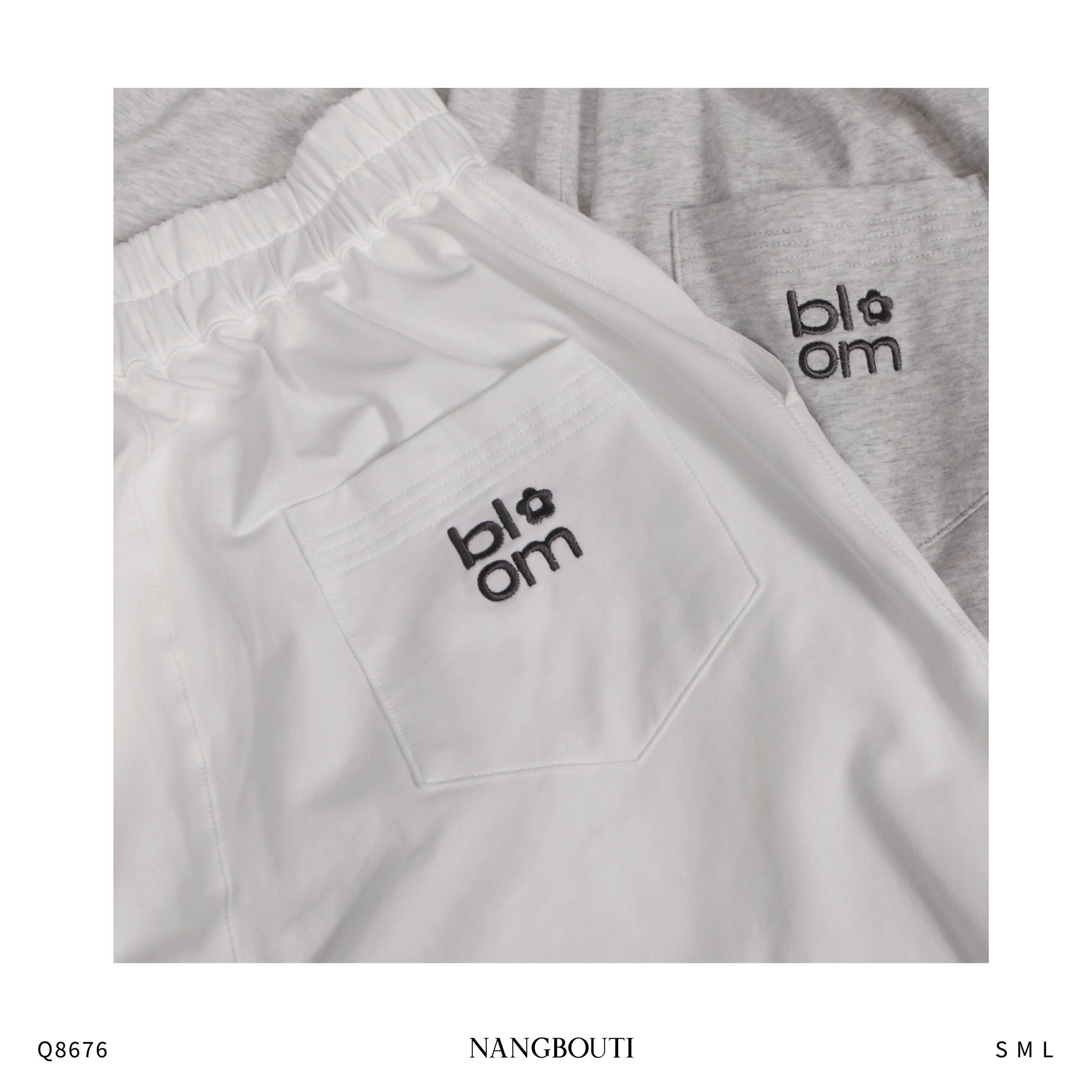 Q8676 - Q thun ống rộng túi xéo lai rut dây thêu Bloom