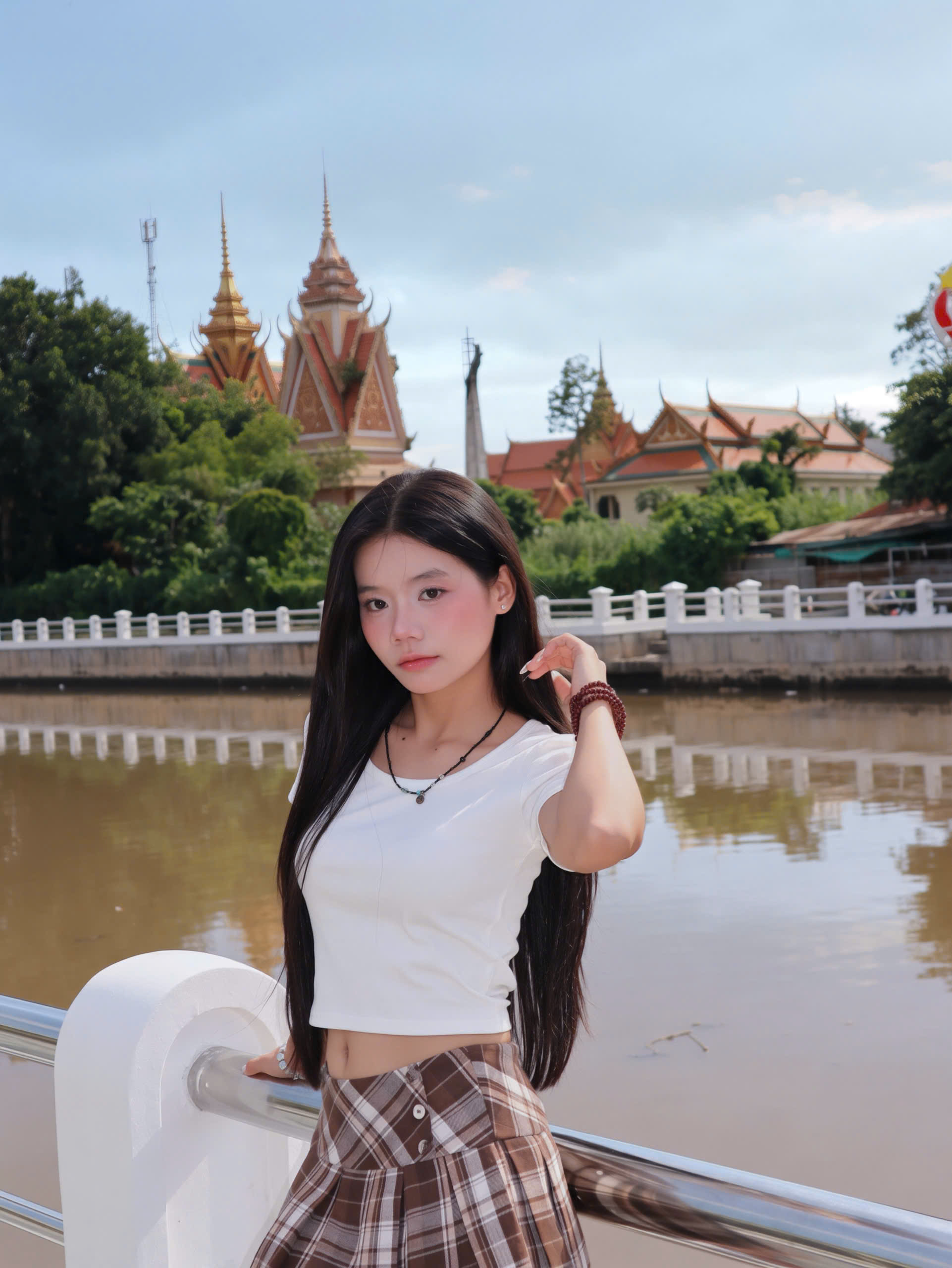 V4134- 	Váy ngắn xếp li caro phối nút