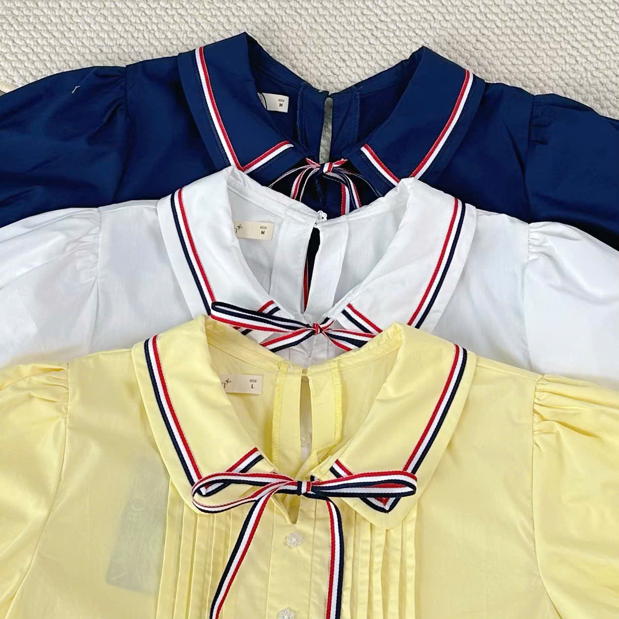 A29644 - A babydoll nhấn li trước lai bèo