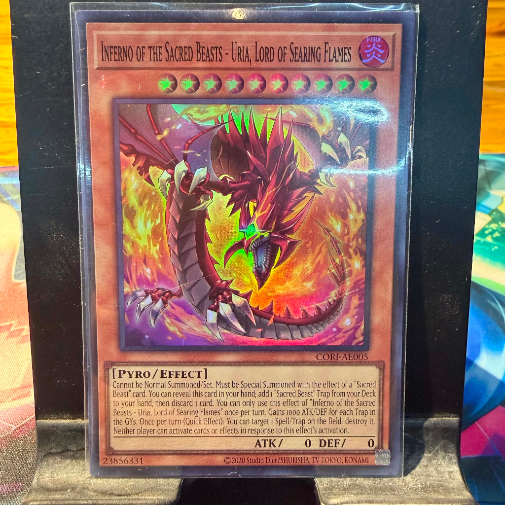 [ Bài Yugioh Chính Hãng ] CORI-AE005 Inferno of the Sacred Beasts - Uria, Lord of Searing Flames - Super Rare