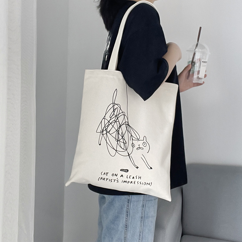 Túi tote hoạ tiết nhiều mèo, đường kẻ