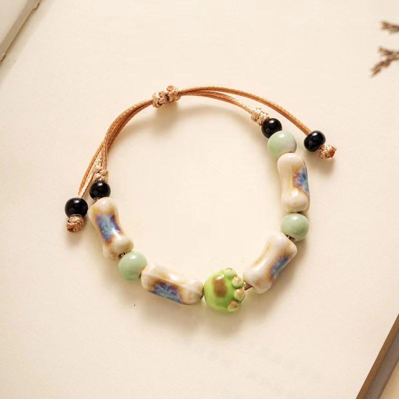 Vòng tay charm chân mèo màu xanh lá