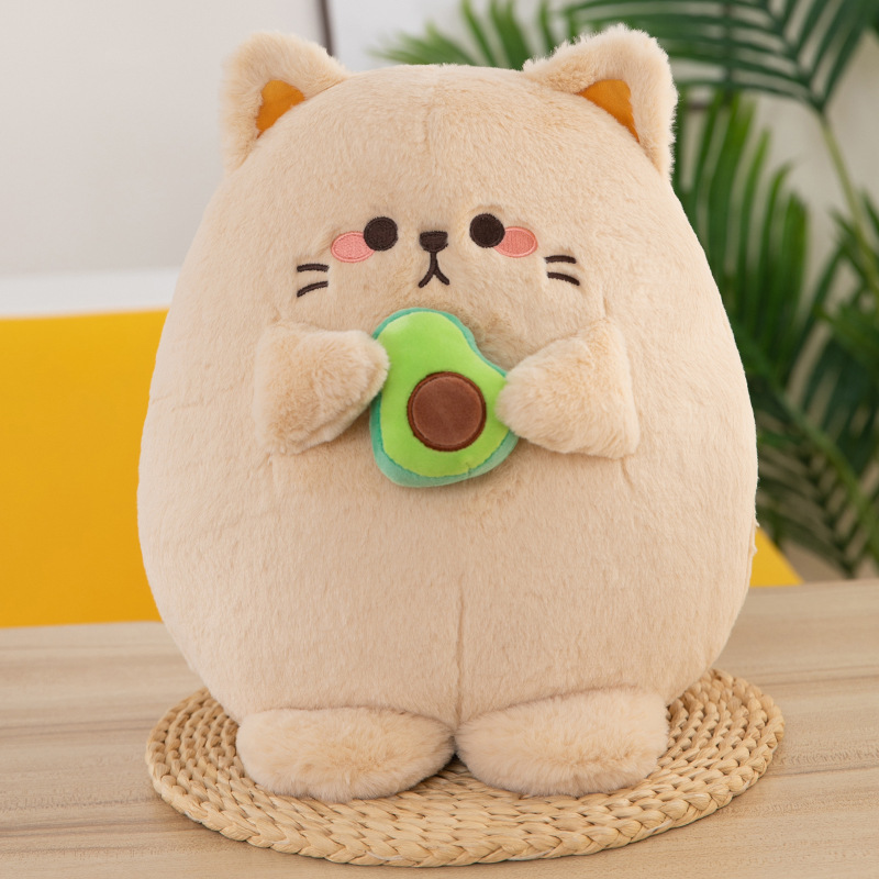 Mèo bông ôm quả bơ