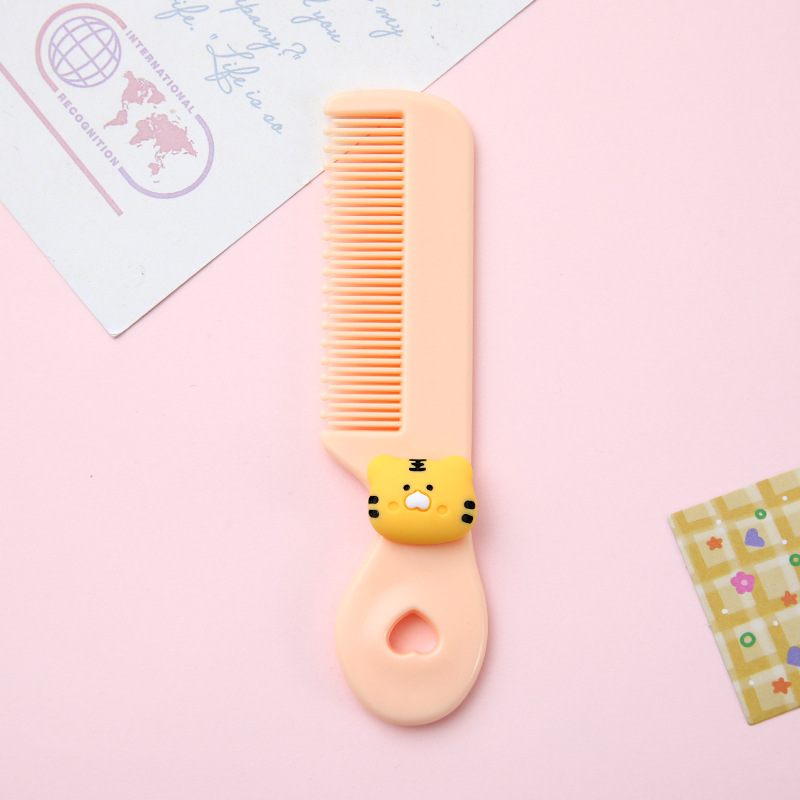 Lược mini màu cam họa tiết hình mèo