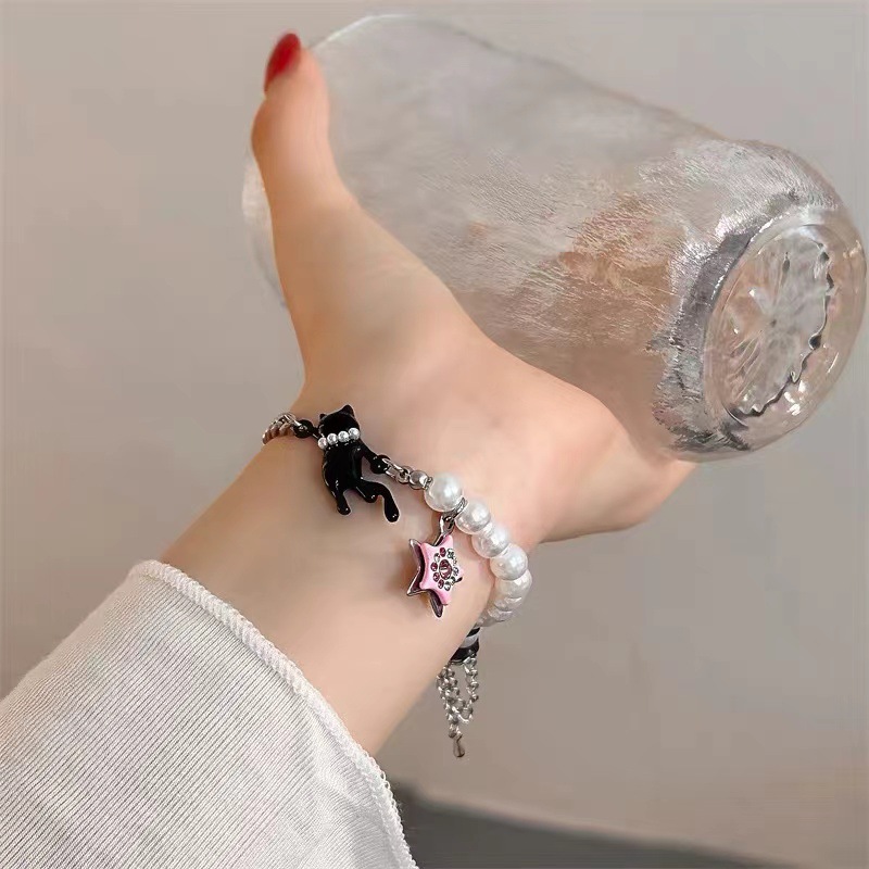 Vòng tay mèo cầm ngôi sao