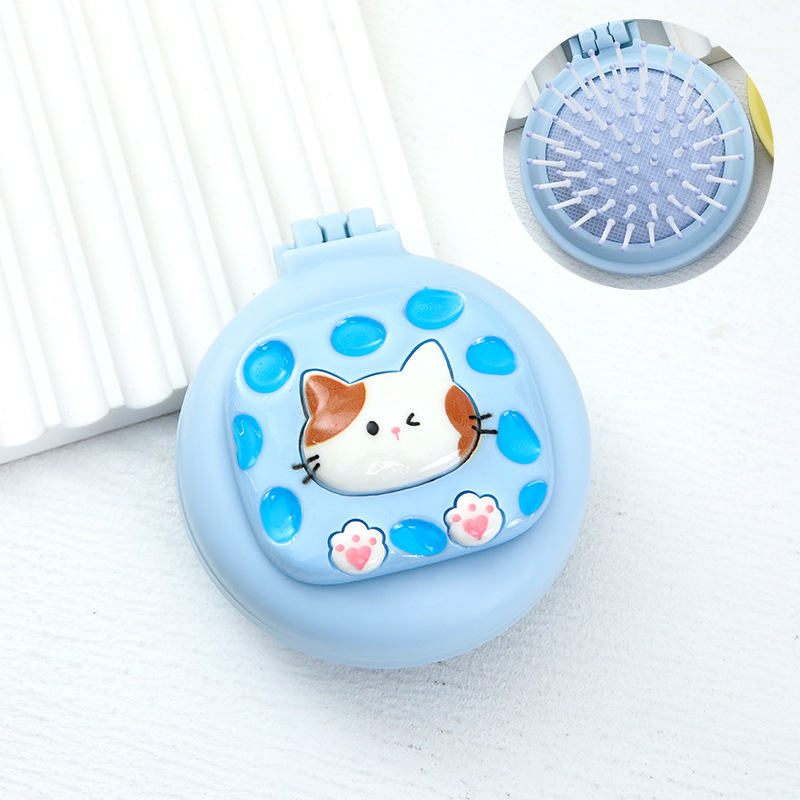 Lược tròn gỡ rối mini màu xanh có hình mèo