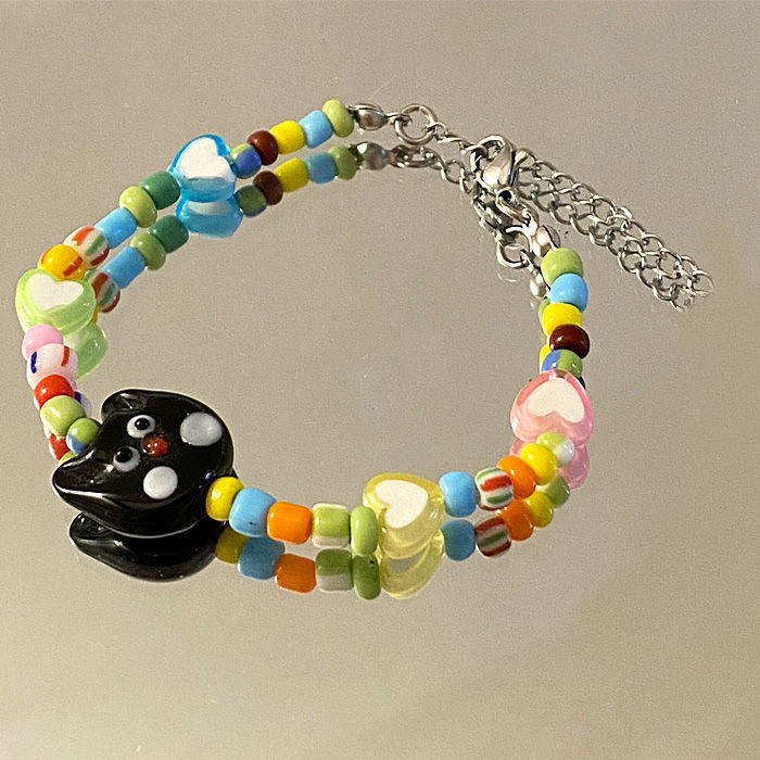 Vòng tay màu sắc kèm charm hình mèo