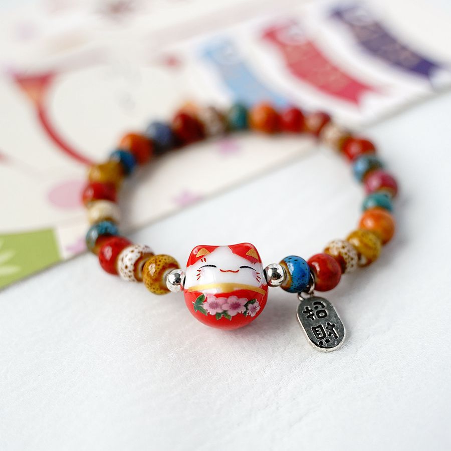 Vòng tay bằng gốm hoạ tiết mèo