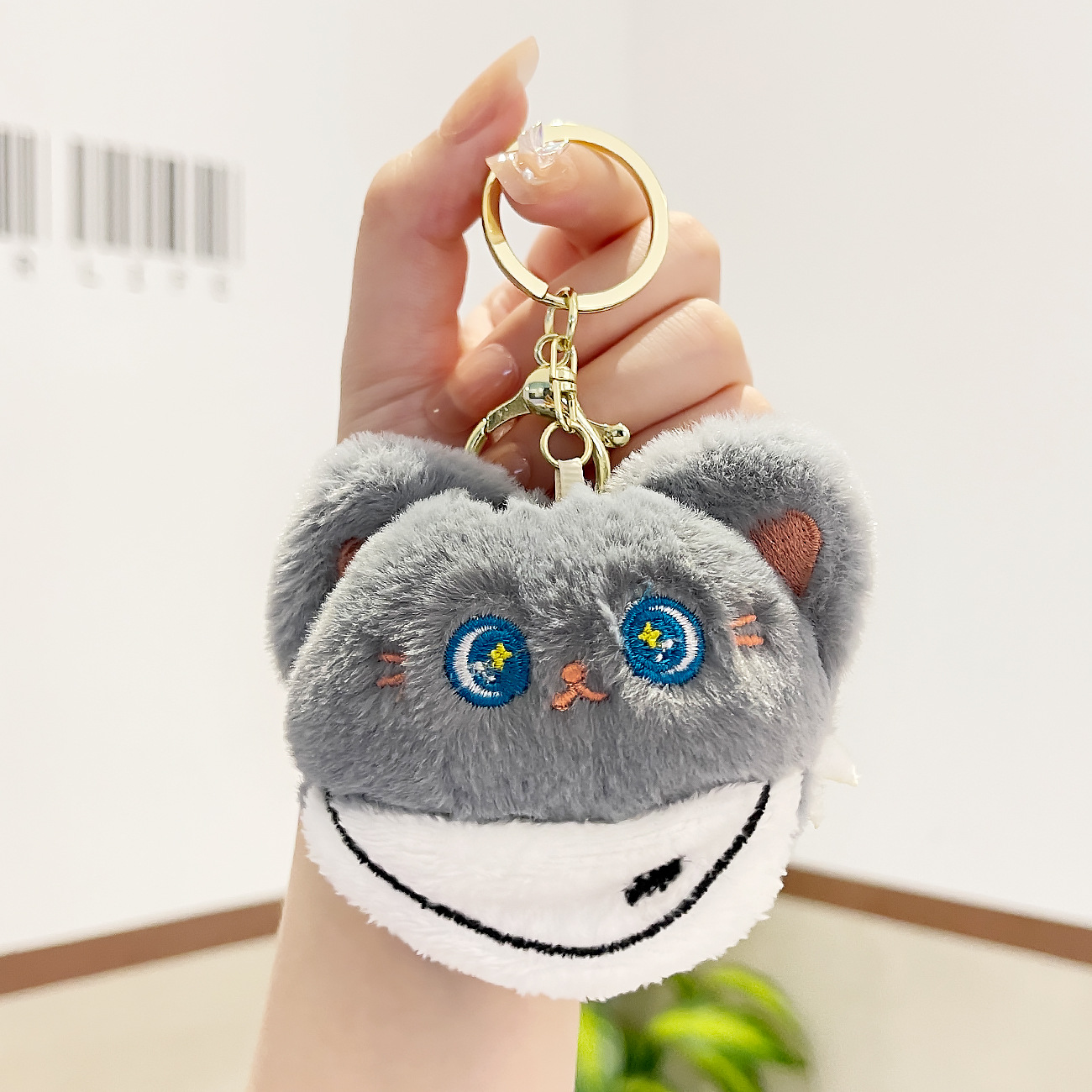 Móc khoá bông hình mèo đeo yếm