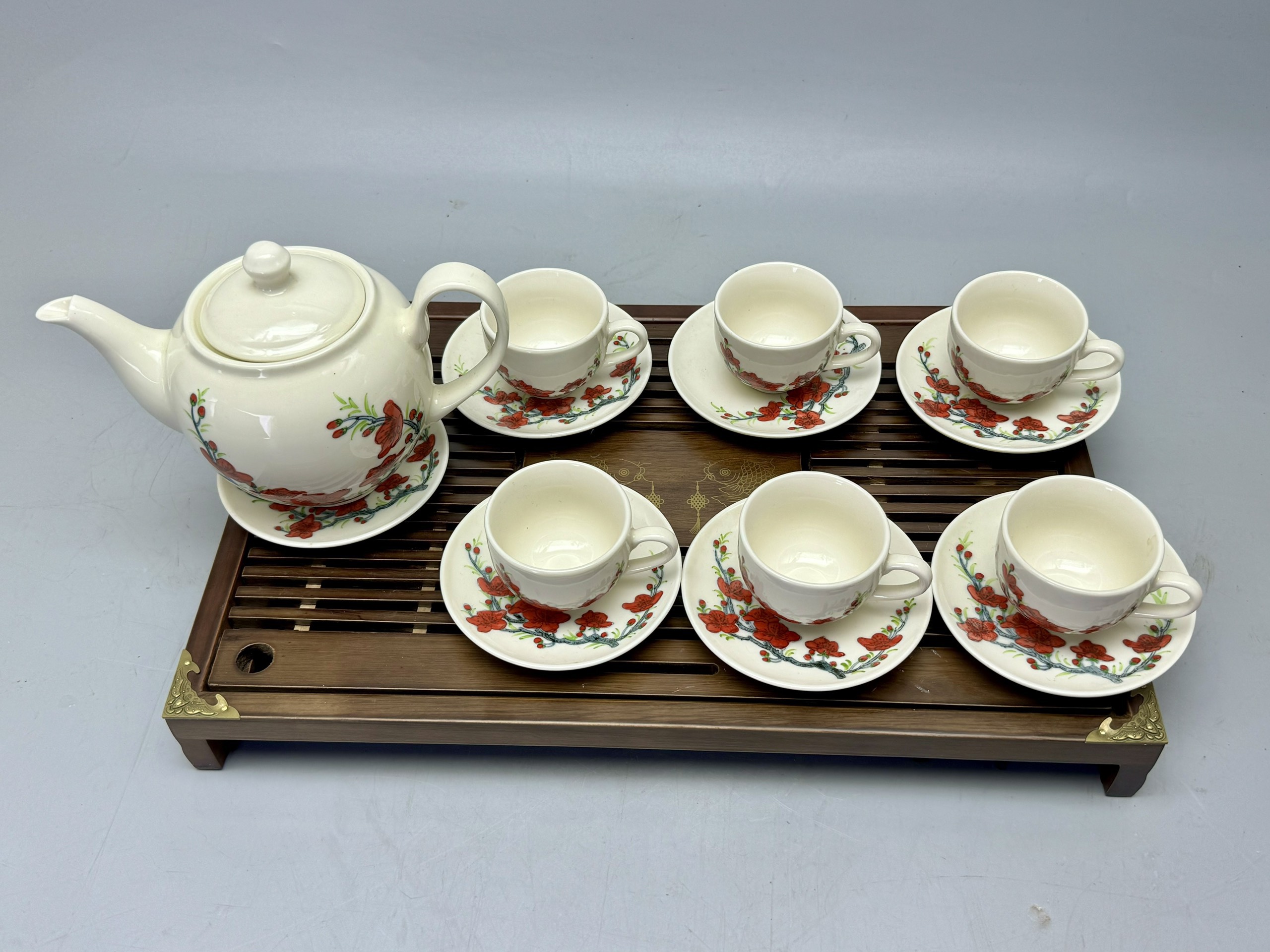 Bộ ấm chén hoa đào chu đậu truyền thống