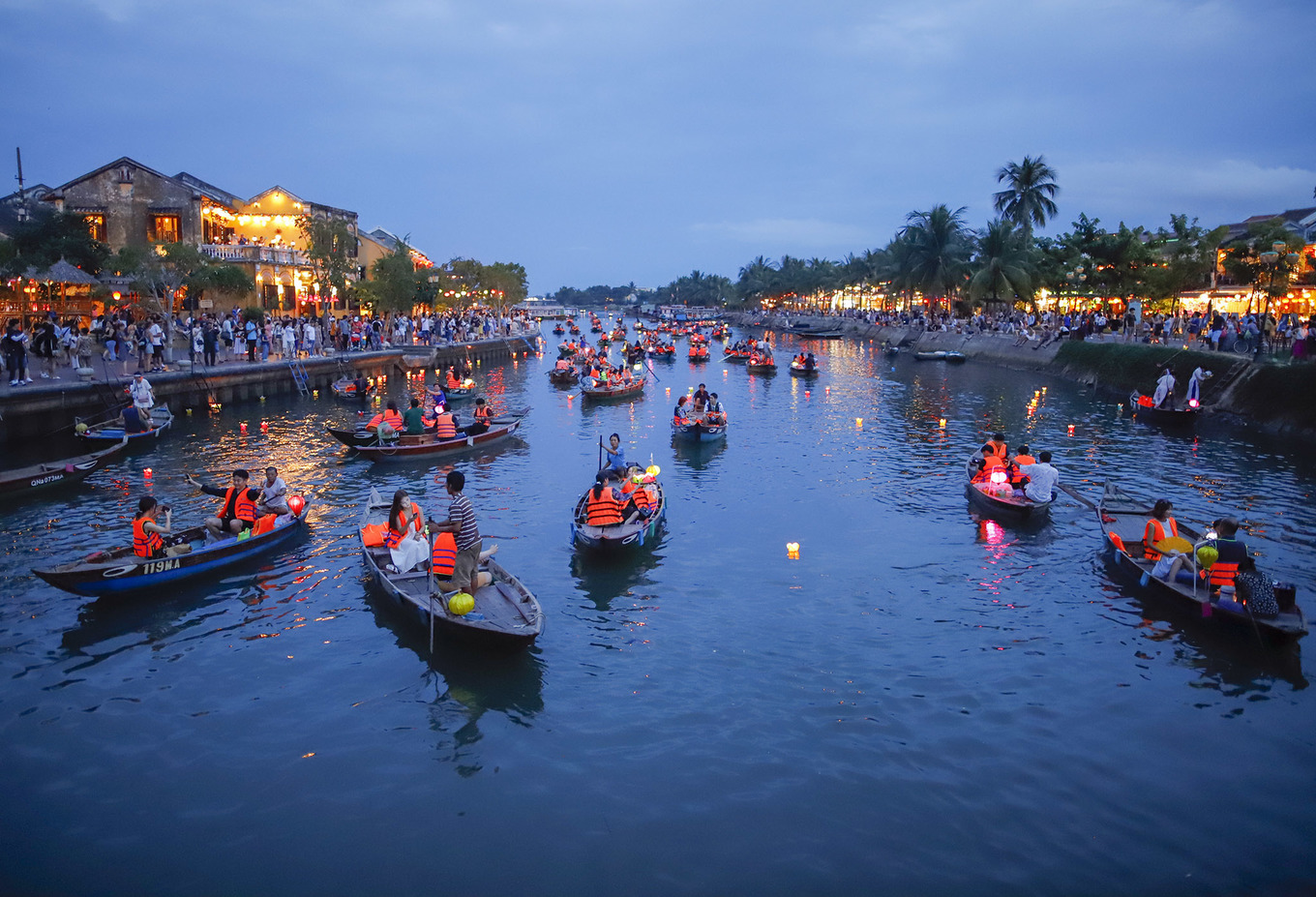 Dropping lanterns on the Hoai river