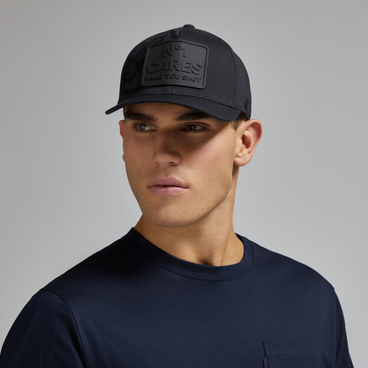 NÓN NO1 CARES PERFORATED FEATHERWEIGHT TECH SNAPBACK