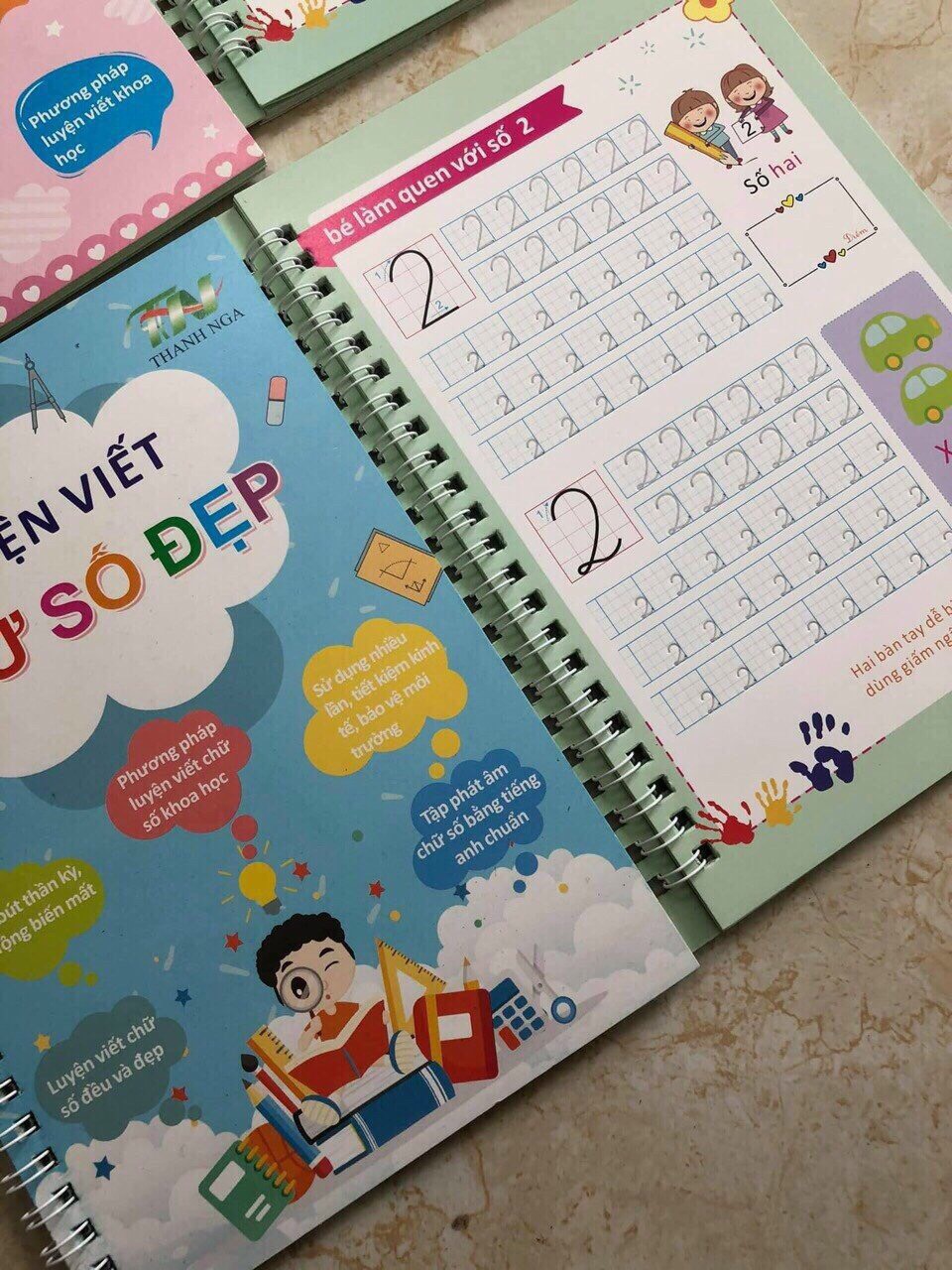 Vở tập viết mực tự xóa Thanh Nga set 3 cuốn tặng kèm 2 bút, 8 ngòi và 2 cá