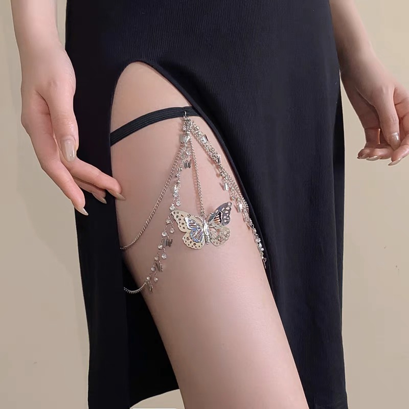 Butterfly necklace worn on thigh