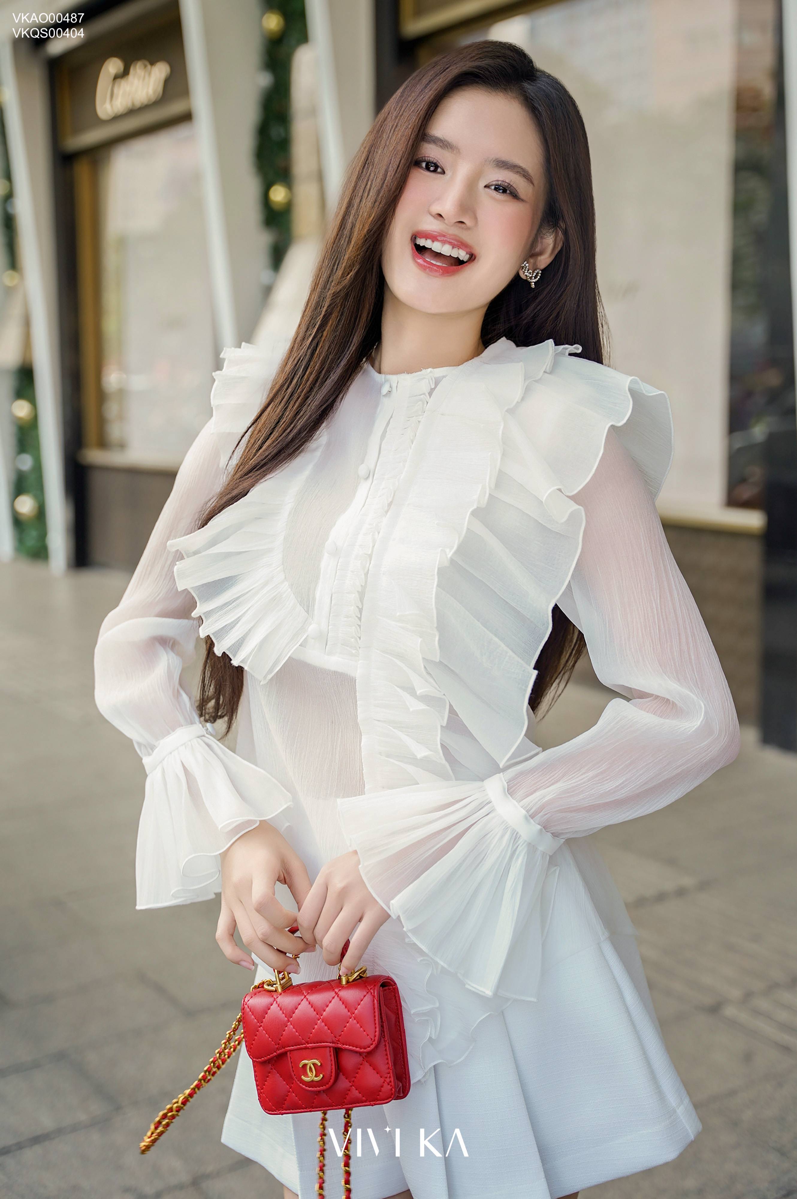 Áo sơ mi cổ bèo tay dài bo chun