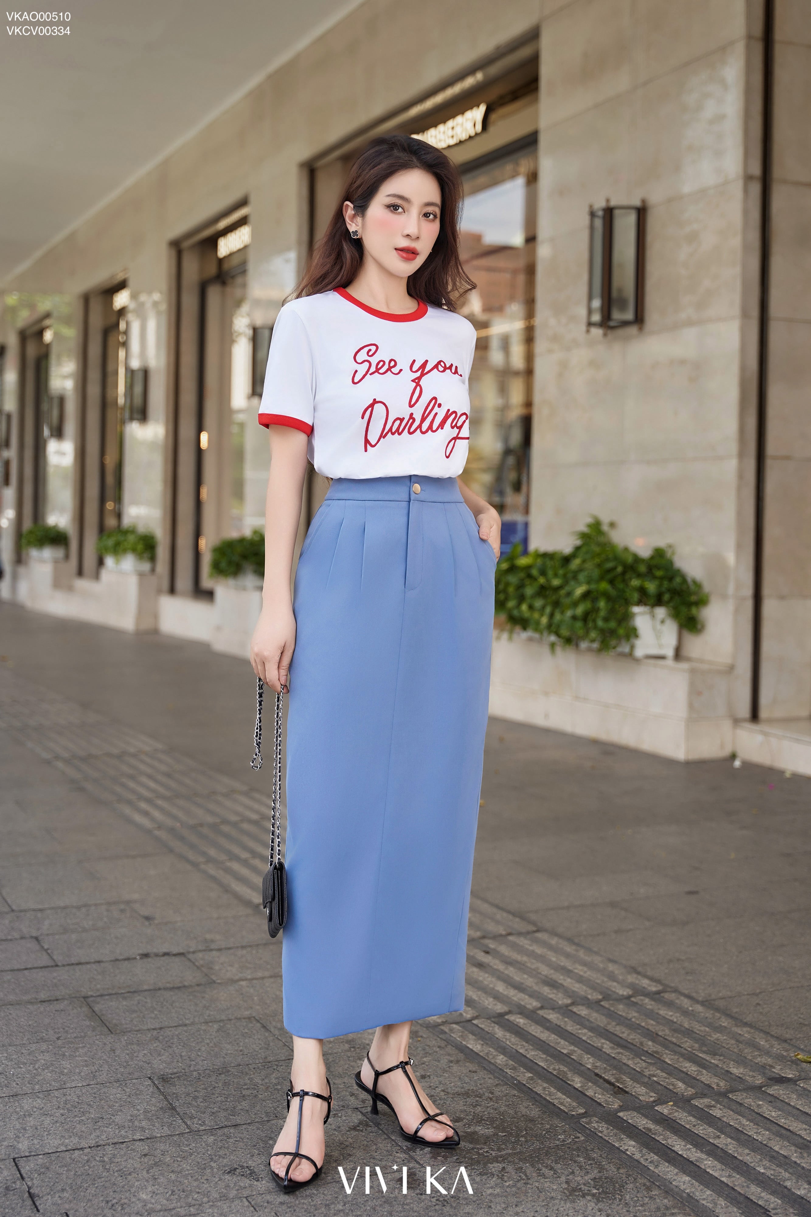 Chân váy bút chì midi xẻ sau