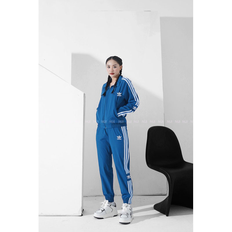 Set thể thao nữ Adidas chất gió co giãn, áo 2 lớp lót lưới, túi quần áo có khoá, set thu đông vnxk BGWM2