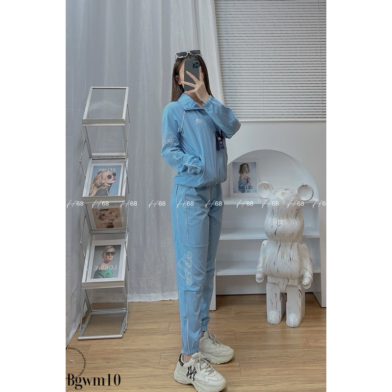 Bộ quần áo thể thao nam nữ Adidas đôi M10 Chất Gió cao cấp co giãn,túi quần áo có khóa, áo 2 lớp lót lưới, set thu đông