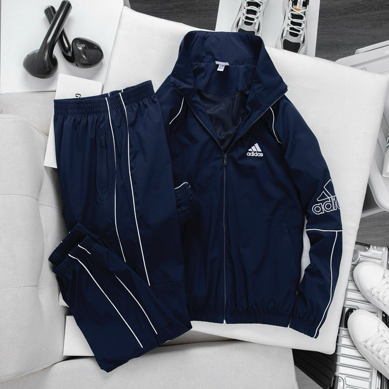 Bộ quần áo thể thao nam nữ Adidas đôi M10 Chất Gió cao cấp co giãn,túi quần áo có khóa, áo 2 lớp lót lưới, set thu đông