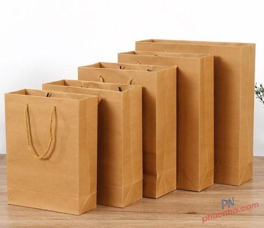 Túi giấy Kraft trơn 15x19x7cm đứng quai vải tròn 180gsm