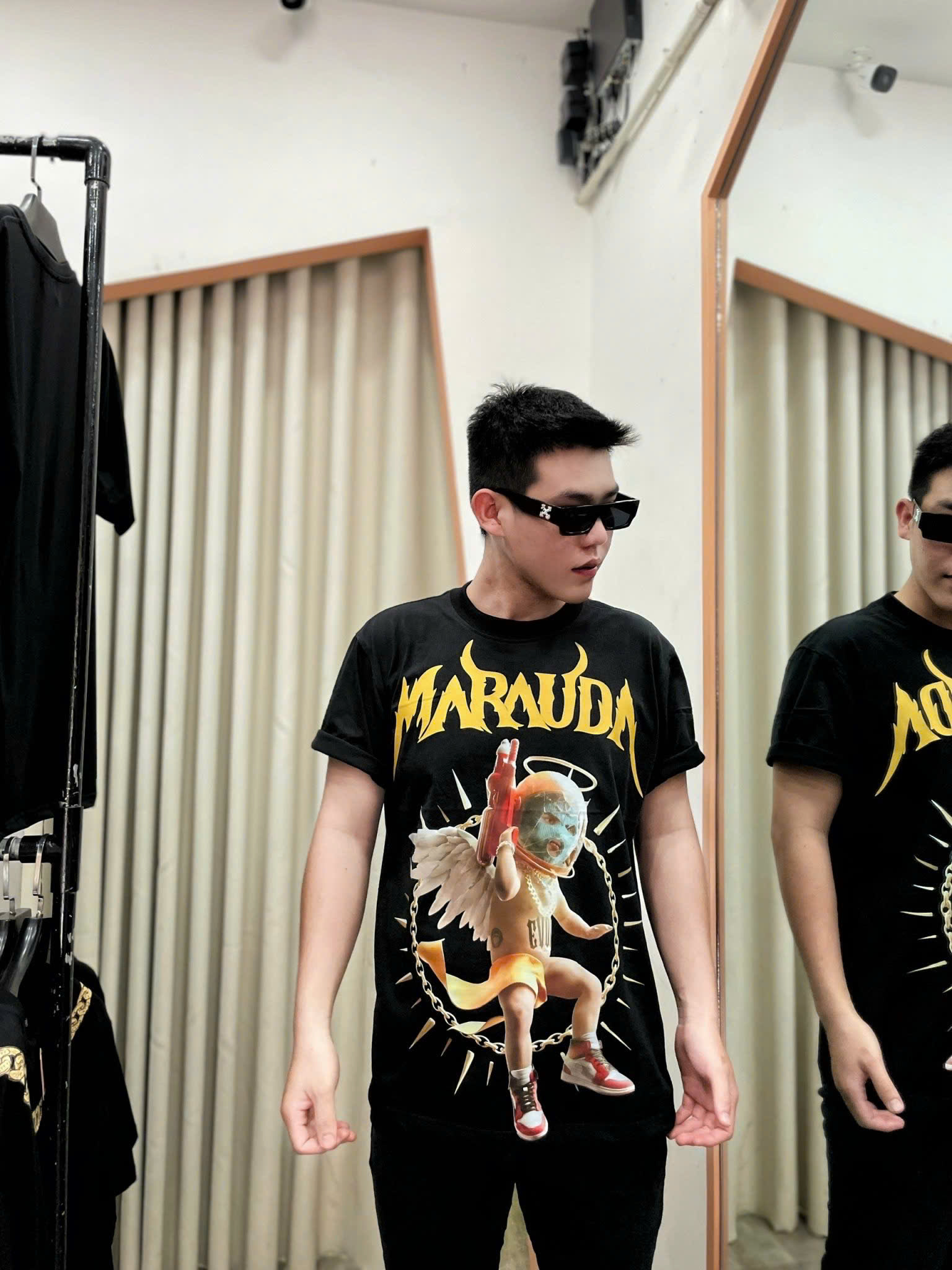 Áo thun GUDA Thien than cam sung