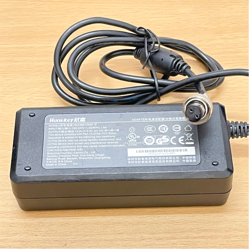 Bộ Chuyển Đổi Nguồn Adapter 12V 5A Huntkey HKA06012050-7F chân cắm Connector Size GX16-2P