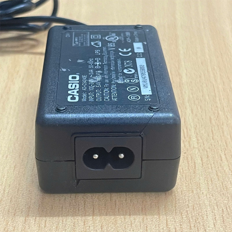 Adapter 5.4V 2.41A CASIO AD-C54240E Connector Size 2.5mm x 1.0mm Hàng Original Đã Qua Sử Dụng For Camera Battery Charger Power Supply Cord