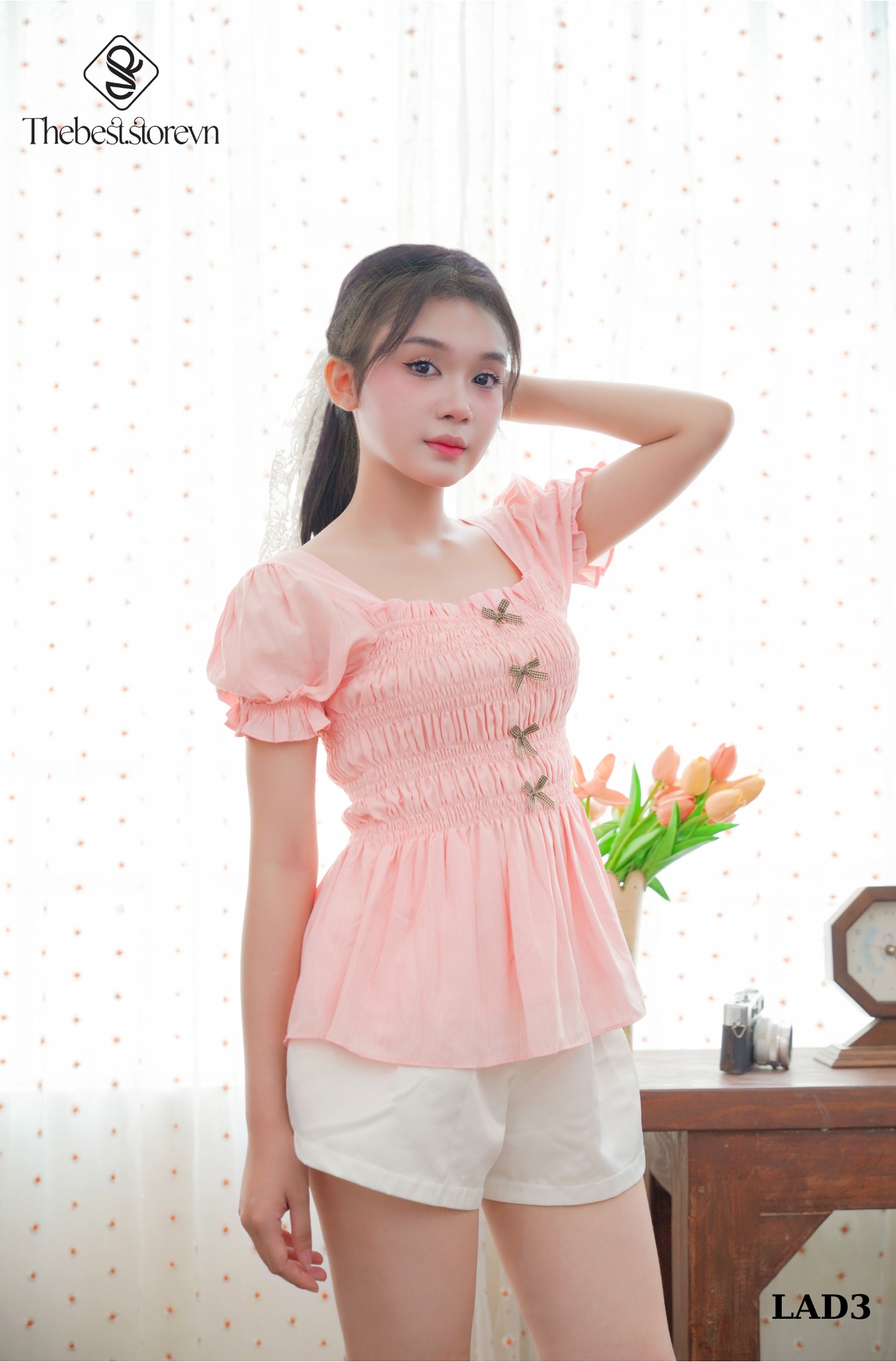 Áo peplum tay phồng đính nơ nâu LAD3
