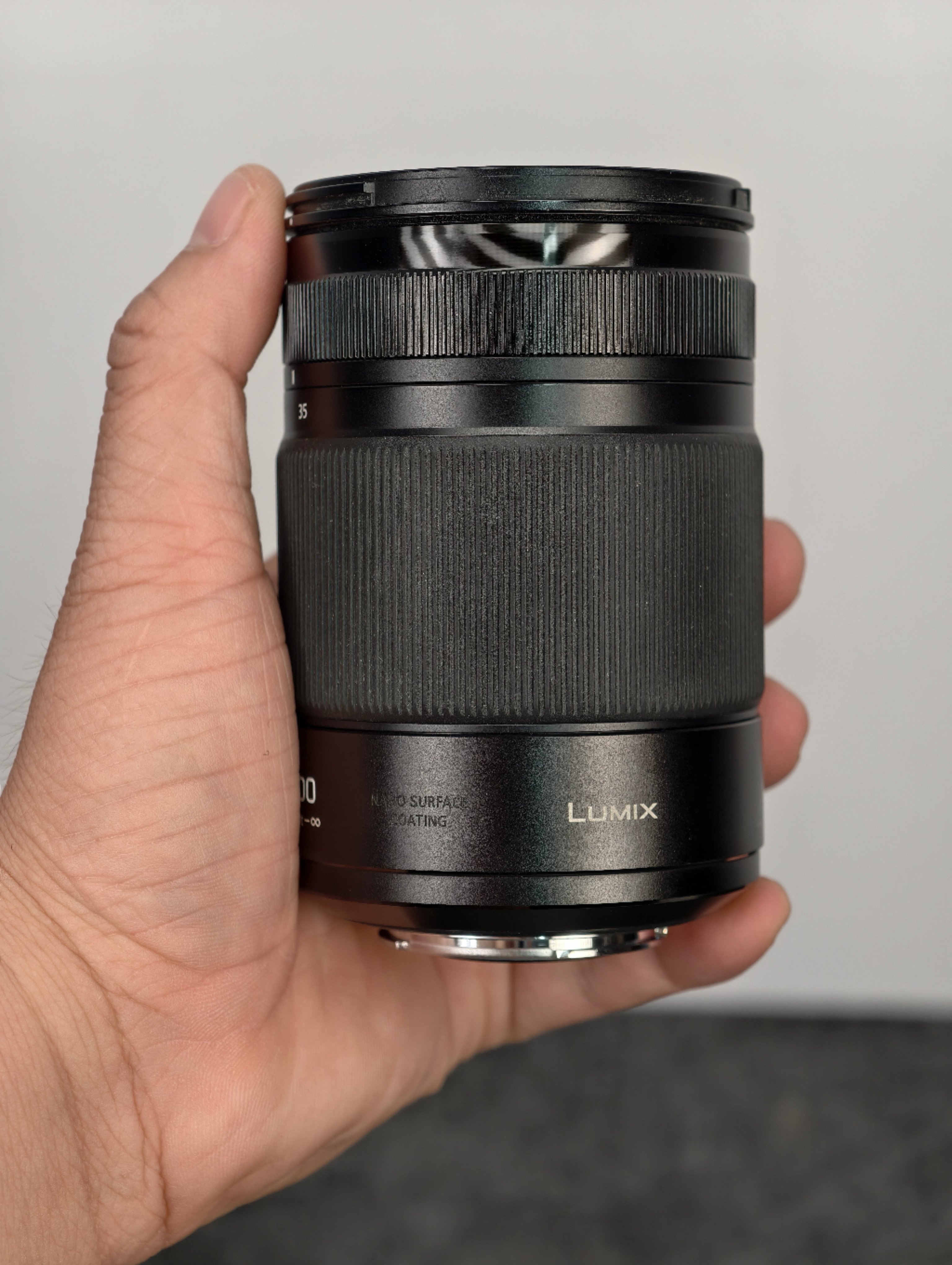 Lumix G 35-100 f2.8 đẹp cap hood zin