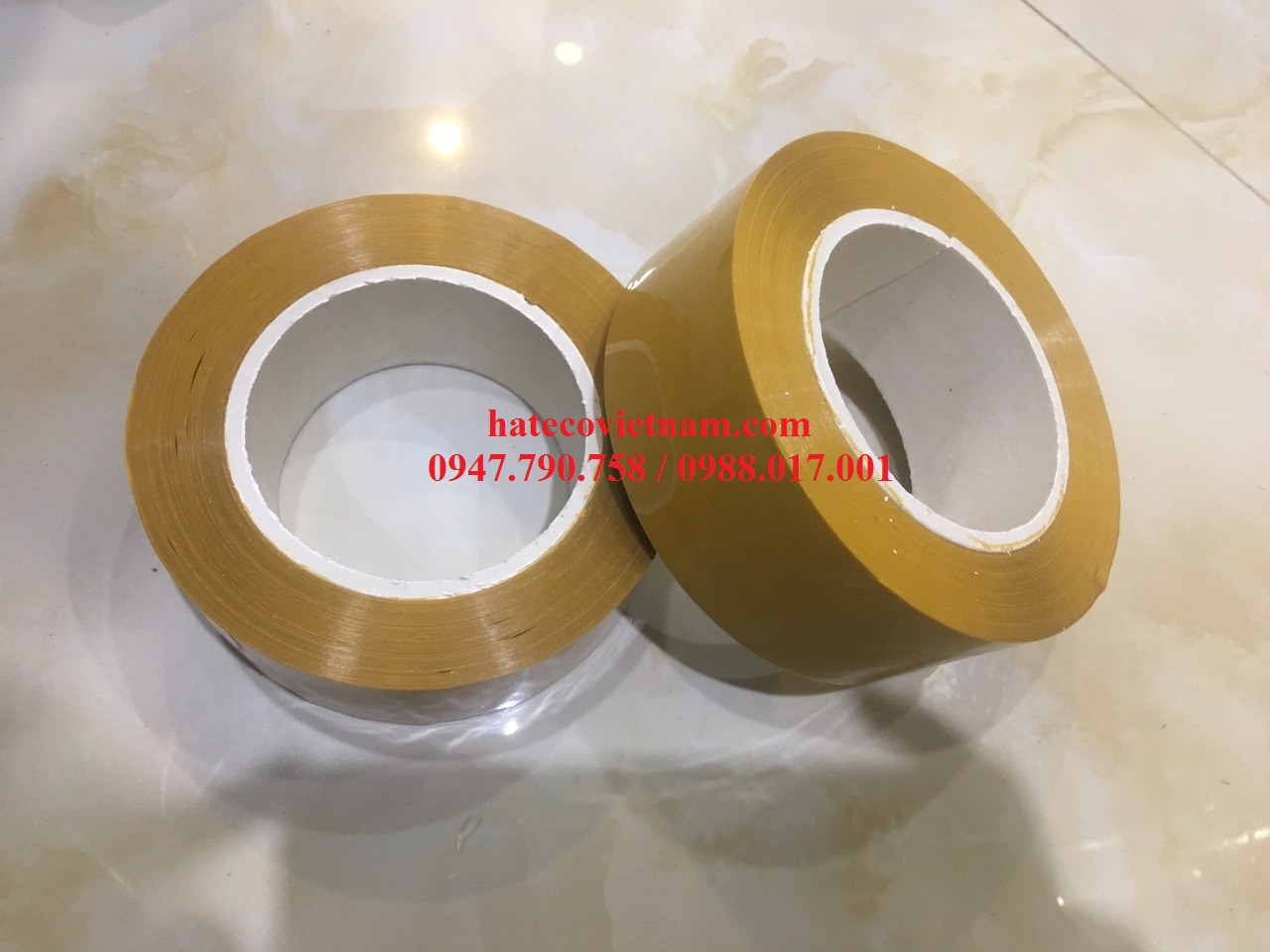 BĂNG DÍNH BĂNG KEO ĐÓNG HÀNG DÁN THÙNG NẶNG 2.4Kg LÕI NHỰA MỎNG 3 LY TRONG/ĐỤC