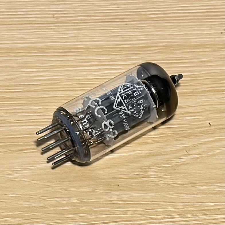One Telefunken ECC82/12AU7 vacuum tube with logo on the bottom, ribbed long plate. 100% TV7 tested.