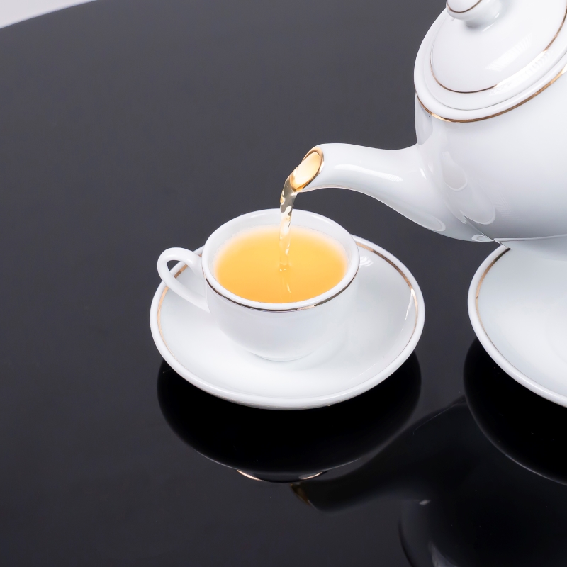 Bộ ấm chén sứ trắng viền vàng