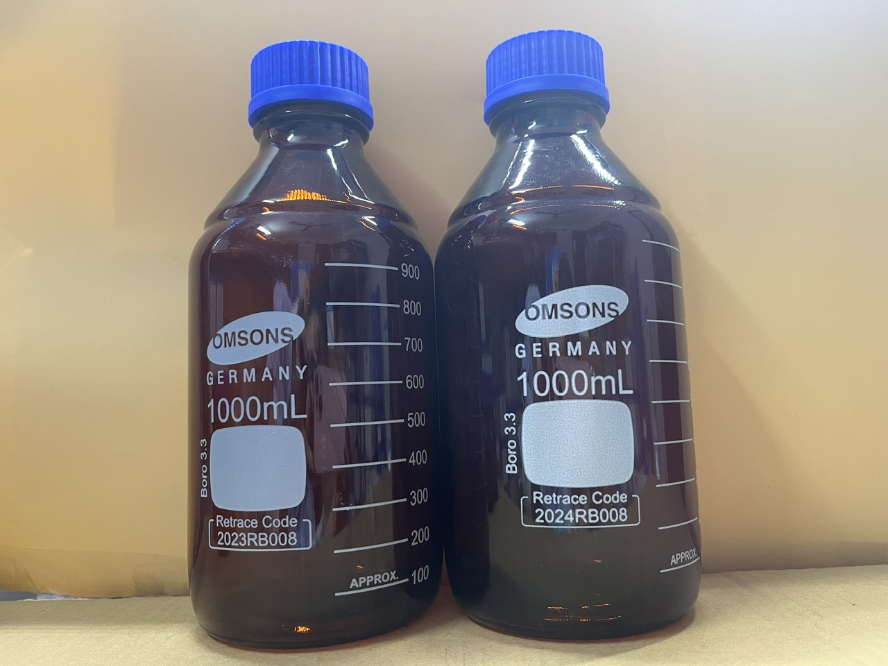 Chai trung tính nâu nắp vặn xanh 1000ml, Hãng OMSONS GERMANY