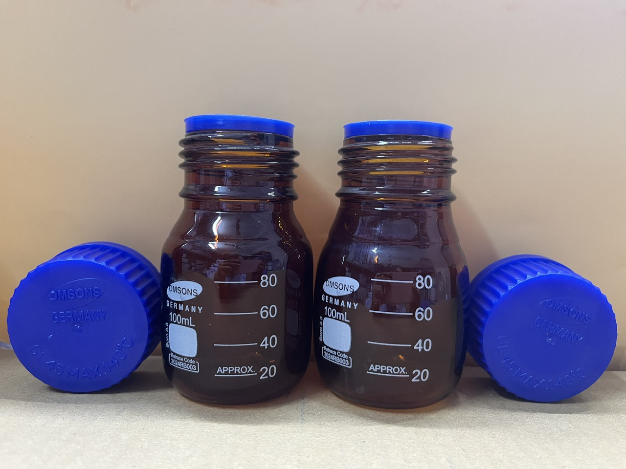Chai trung tính nâu nắp vặn xanh 100ml, Hãng OMSONS GERMANY
