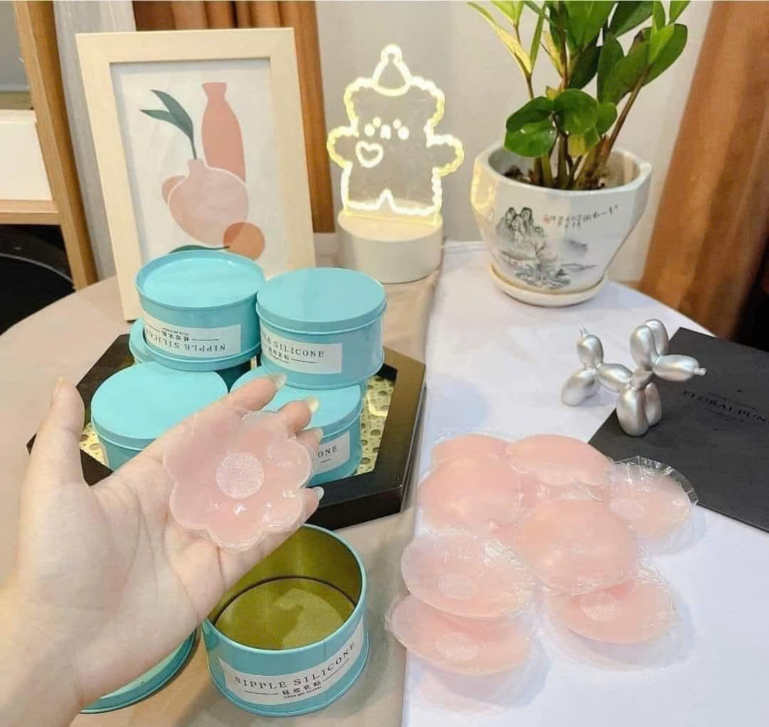 HỘP 5 CẶP DÁN TI SILICON HOA MAI
