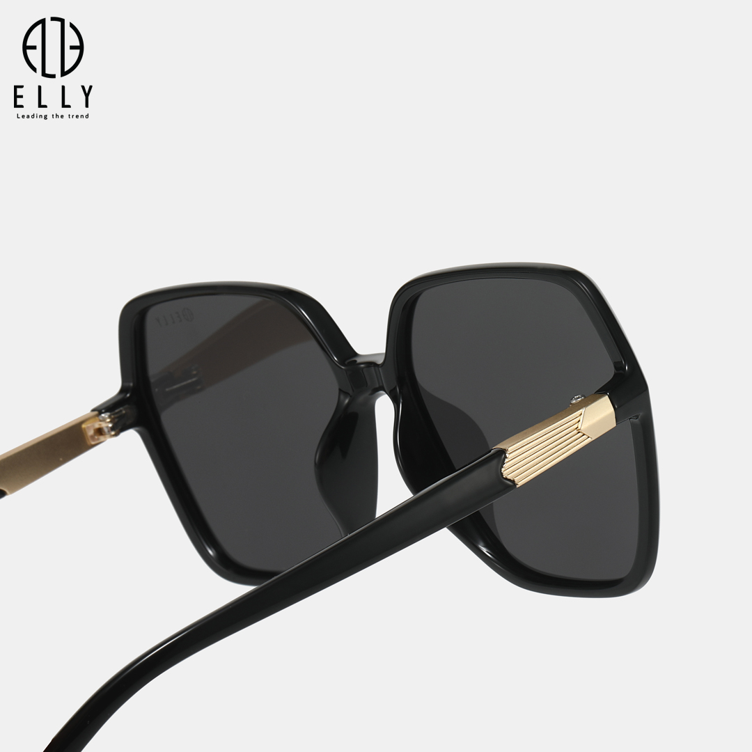 Thiết kế bản lề kim loại ánh vàng ở cạnh kính là điểm nhấn tinh tế, mang lại cảm giác sang trọng cho tổng thể