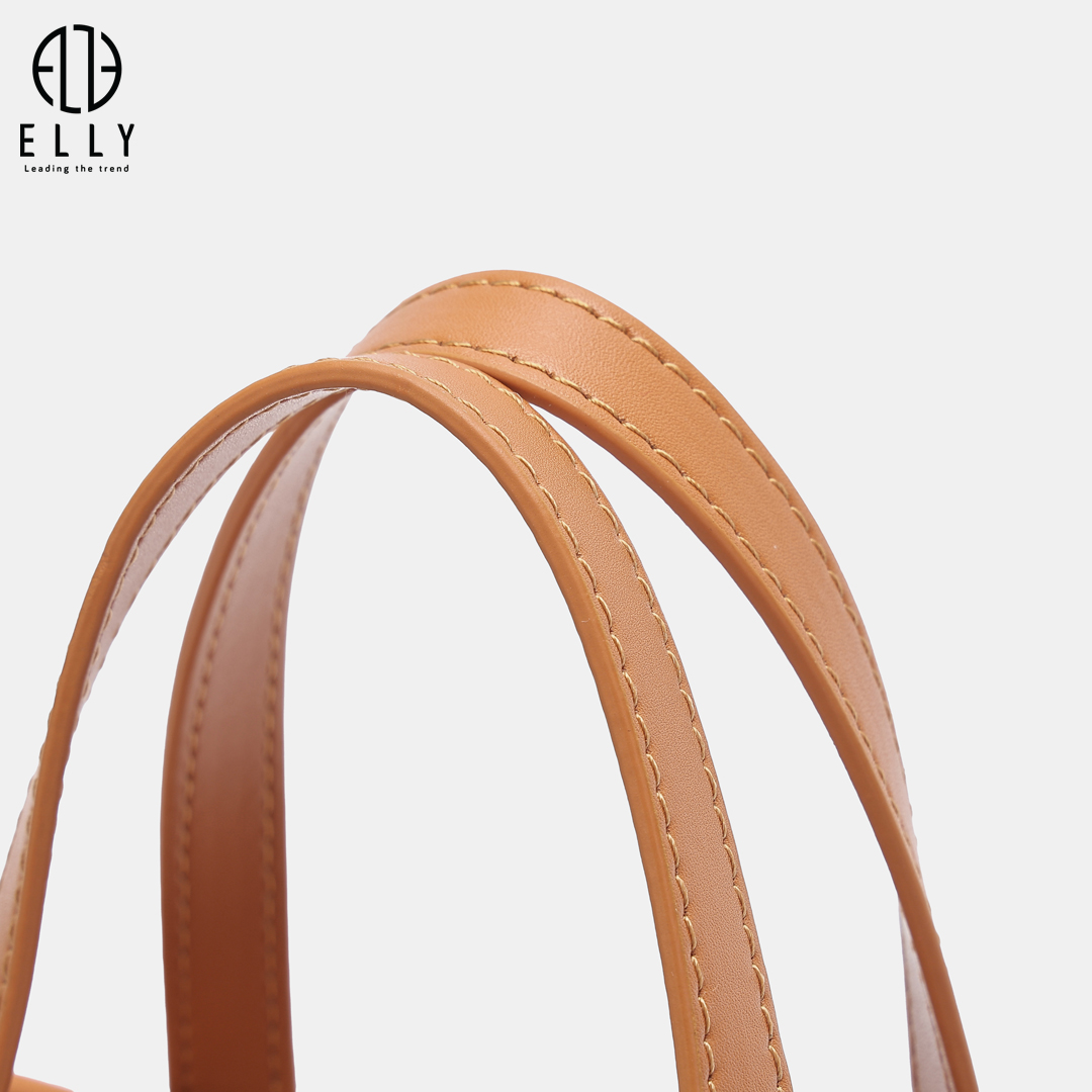 Lớp da phối màu nâu caramel tạo điểm nhấn tinh tế, tăng chiều sâu cho tổng thể thiết kế.