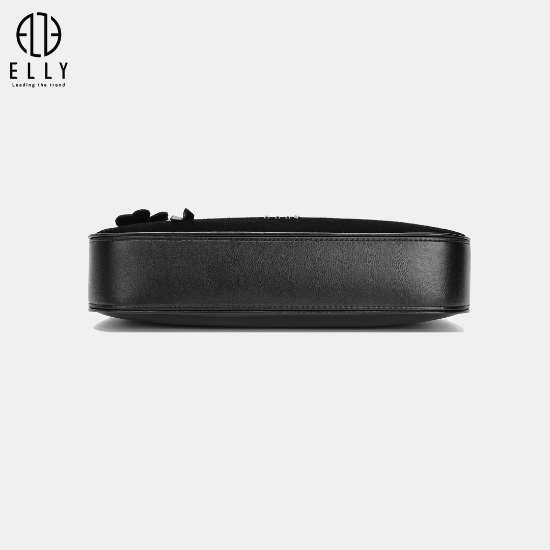 Mặt sau, cạnh và đáy túi bằng da trơn, giúp giữ form ổn định và hạn chế trầy xước trong quá trình sử dụng.