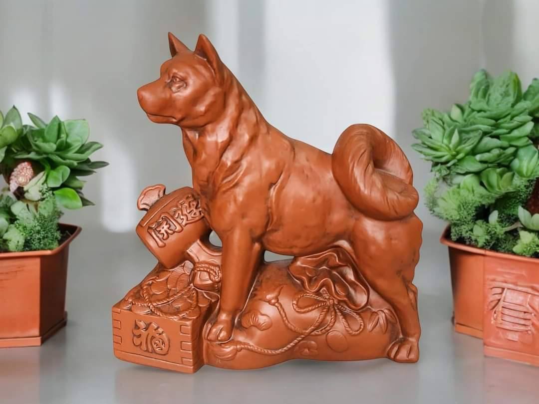 Tượng chó túi vàng &búa chiêu tài