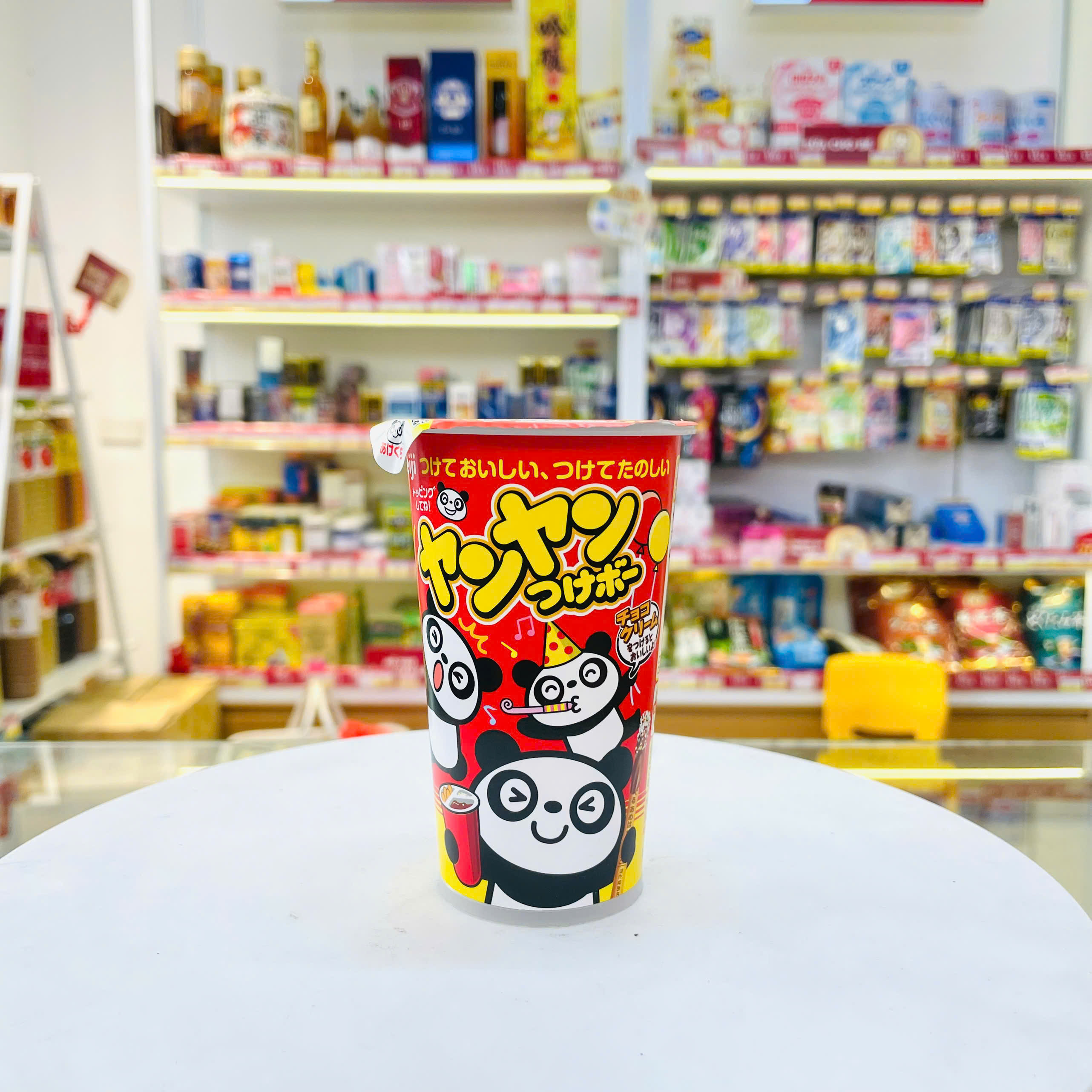 Bánh que chấm socola phủ cốm Panda Meiji