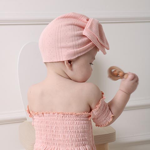 Set bodysuit cotton bo chun và nón nơ hồng