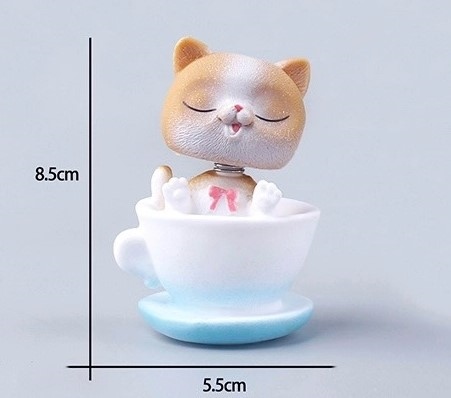 Trang trí mèo nhựa ngồi cốc xanh (lò xo)