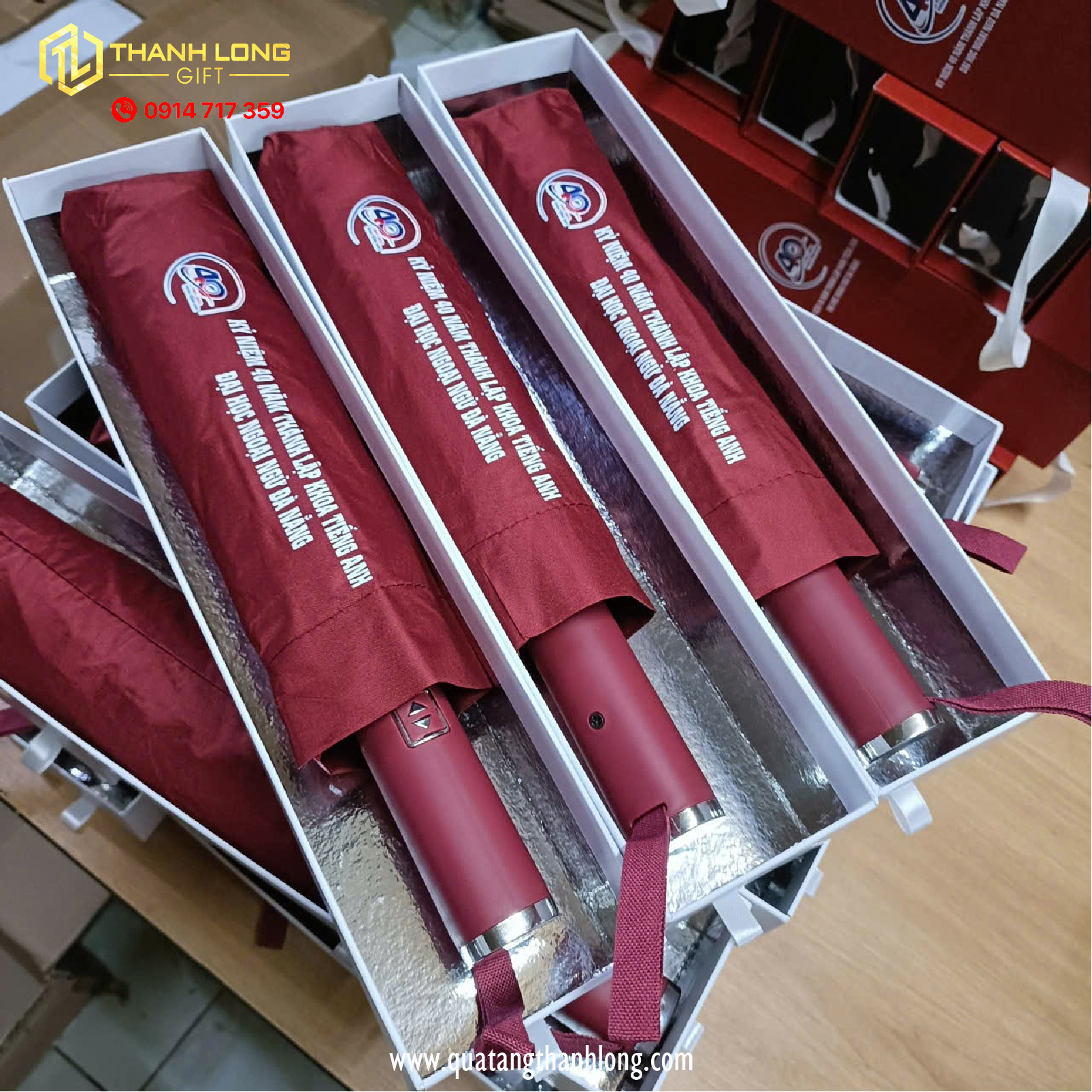 Dù cầm tay in logo - Trường Đại học Ngoại Ngữ, Đà Nẵng