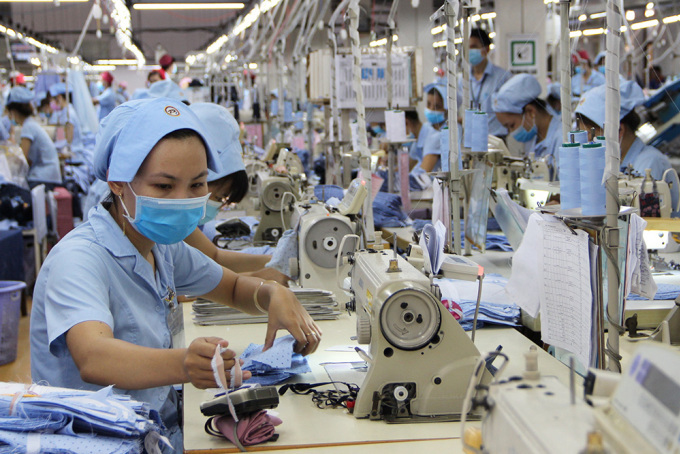 Nhiều nhà máy chủ động tăng lương cho công nhân