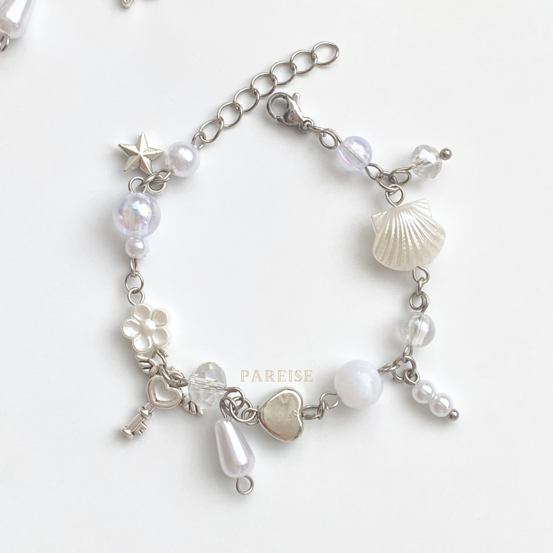 Vòng tay coquette trắng thép ko gỉ