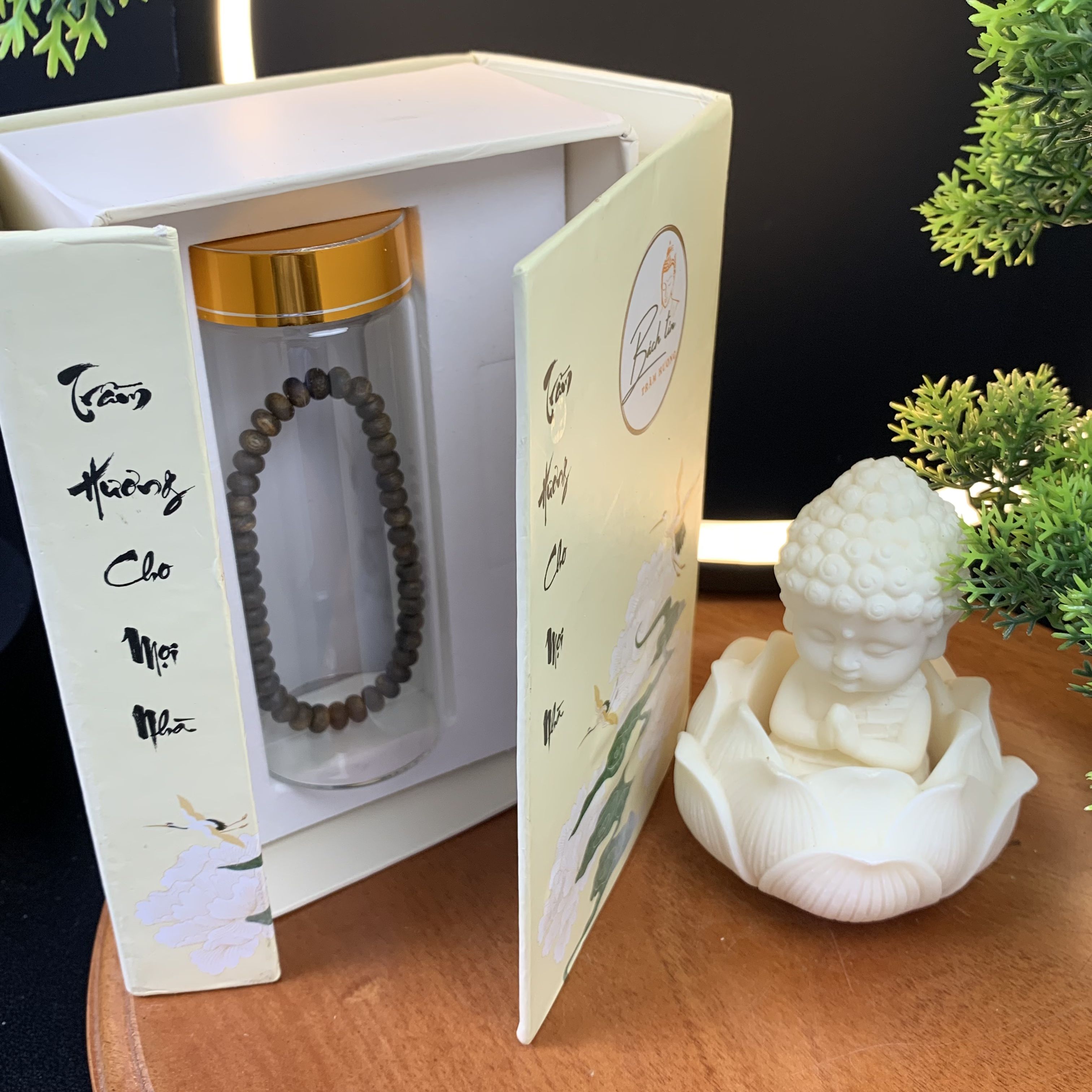 Vòng tay trầm hương Kỳ Hải Nam hạt bàn tính đơn tay nữ 6li nặng 4gram cận chìm dầu đen 050